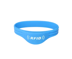 The Wristband For Access Control is a blue RFID wristband featuring two horizontal grooves on each side, with the letters "RFID" prominently printed in white on the front, making it an ideal solution for access control.